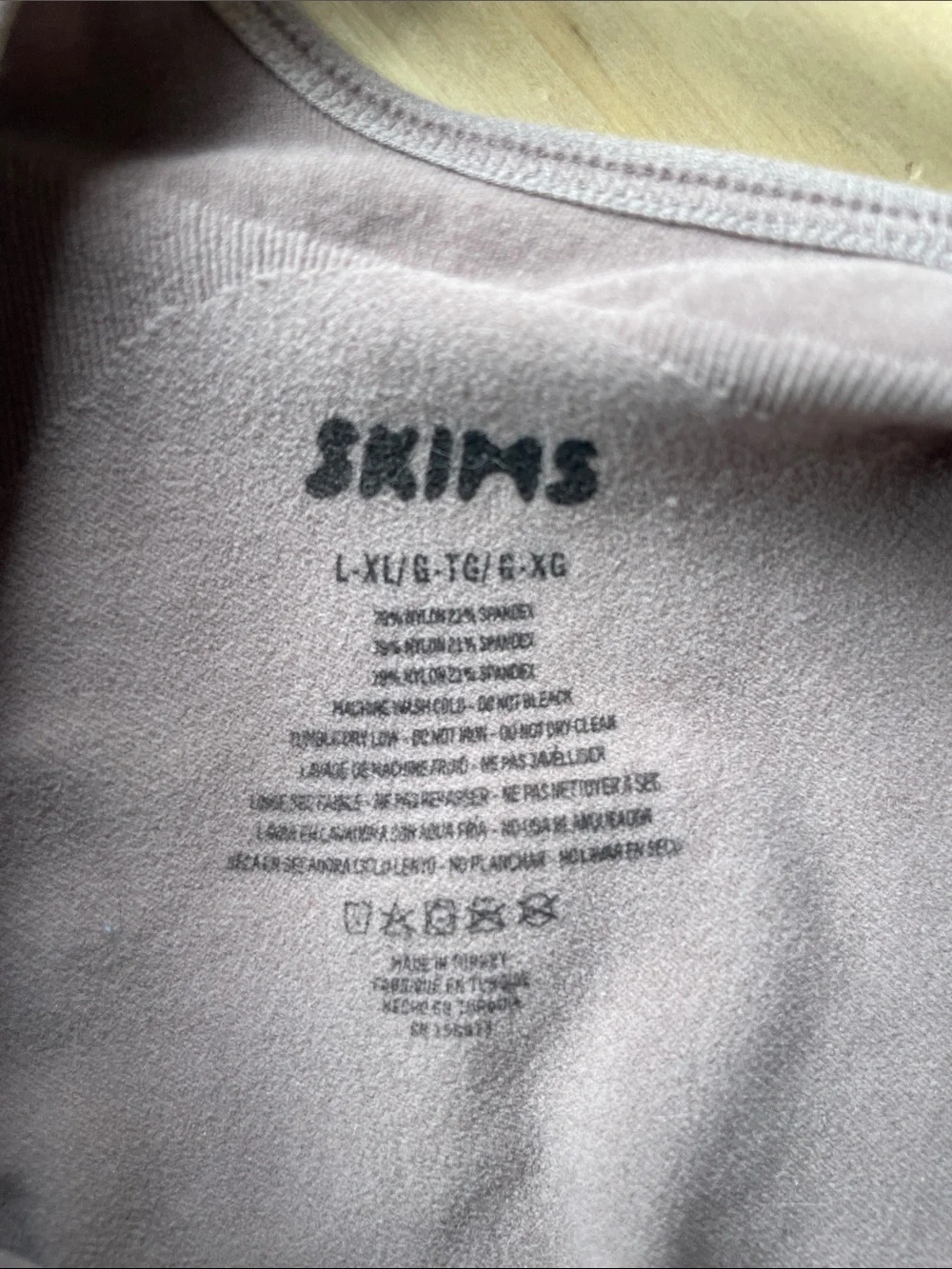 SKIMS Mauve Ruched Thong Bodysuit